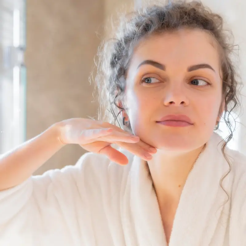 Front view woman in bath robe